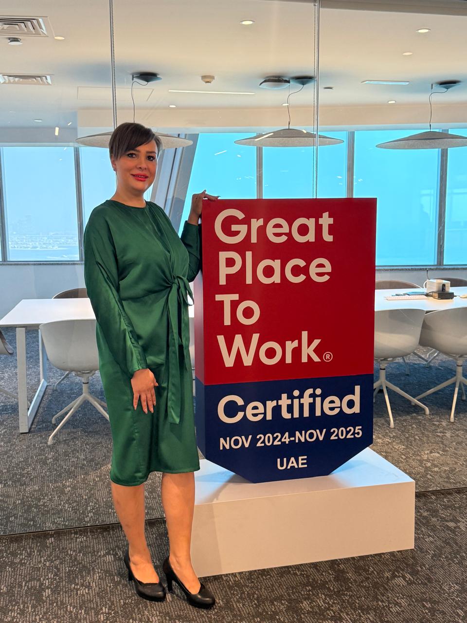 Marwa Fawzi - Real Estate Professional Portrait with Aviation Background